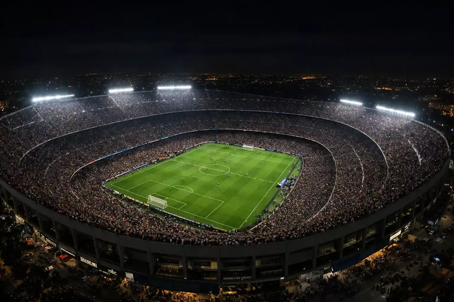 Vista panorámica del Camp Nou durante un partido nocturno